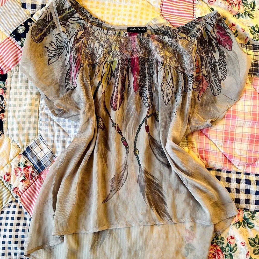 Boho feather print blouse with lace trim and flowy